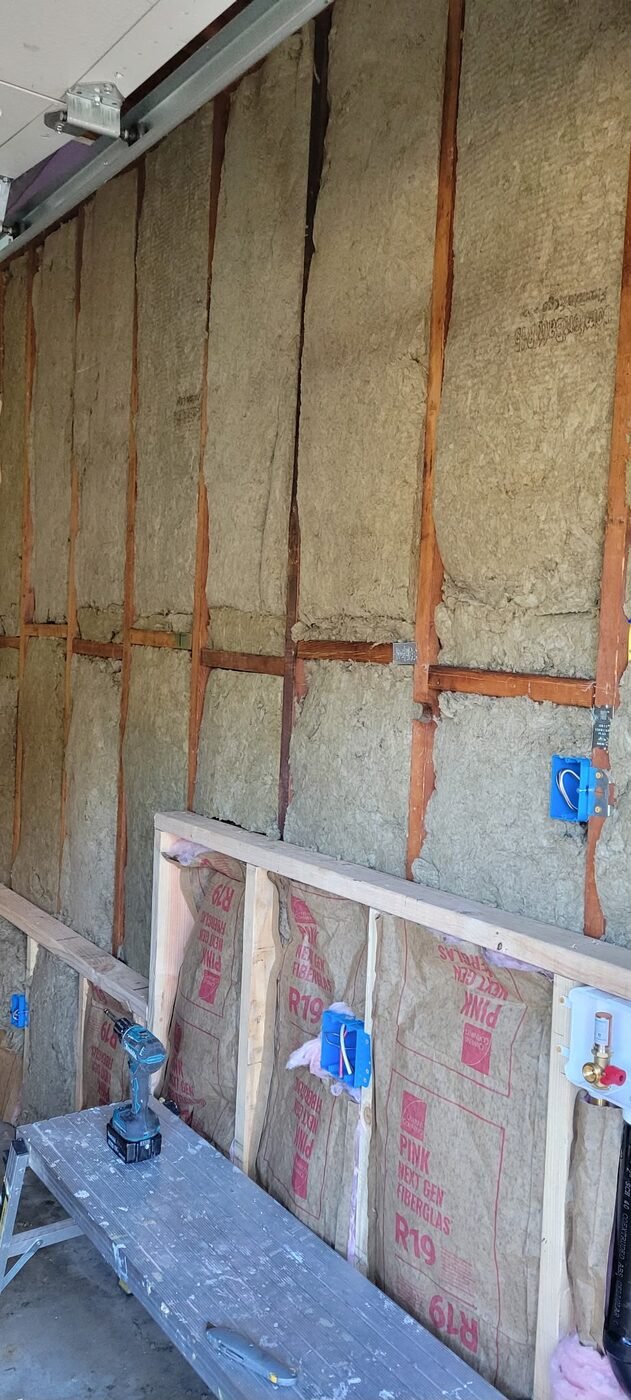 Garage wall insulation installation